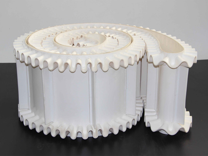 输送颗粒状石蜡的裙边挡板<i style='color:red'>输送带</i>